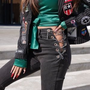 Jeans with trendy chains on the sides